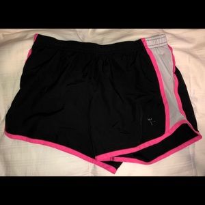 pink and black dry-fit shorts